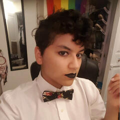 A bon fire at night, above it in a handwritten text are the words 'ritual six'