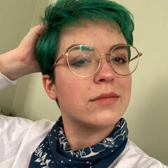 A bon fire at night, above it in a handwritten text are the words 'ritual six'